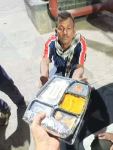 food distribution for small poor old man in delhi from aapke saath foundation team in holi