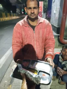 food distribution for small poor old man in delhi from aapke saath foundation team in holi