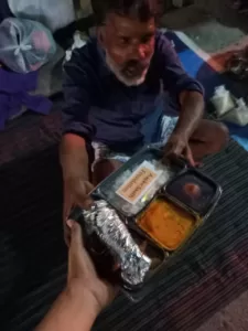 food distribution for small poor old man in delhi from aapke saath foundation team in holi
