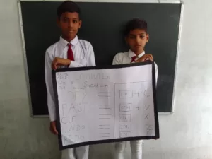 school kids howing his activity work