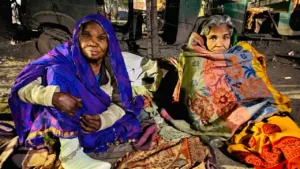 Blanket distribution to poor and needy people, homeless, kid.