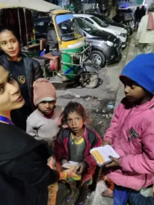 food distribution to homeless poor children in delhi