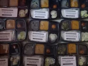 food distribution for a poor slum kid in delhi on independence day