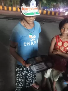 food distribution for a poor slum kid in delhi on independence day
