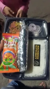 food distribution for orphanage by volunteer of aapke saath foundation on festival holi
