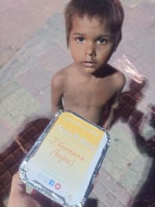 Food packet distribution organized by Aapke Saath Foundation in celebration of a donor's birthday.