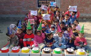 Birthday cake cutting with orphanage kids during food donation