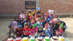 food distribution and cake cutting organised by aapke saath foundation delhi