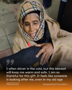 Children receive woolen caps and socks with bright smiles, as volunteers from Aapke Saath Foundation distribute winter essentials to those in need."