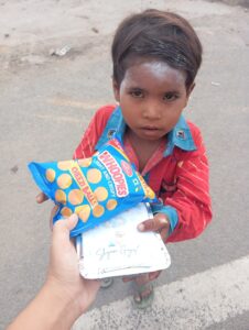 food donation in the slum kid