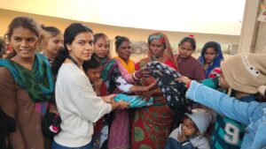 cloths distribution in slum picture