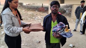 cloths distribution in slum picture