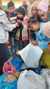 cloths distribution in slum picture