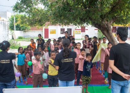 Volunteers giving motivational speech to school children in Bareilly village school